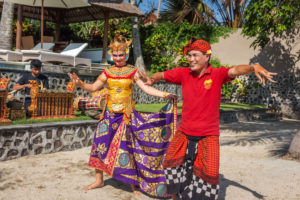 A private family Balinese dance lesson while wearing Balinese costumes at Citakara Sari Estate